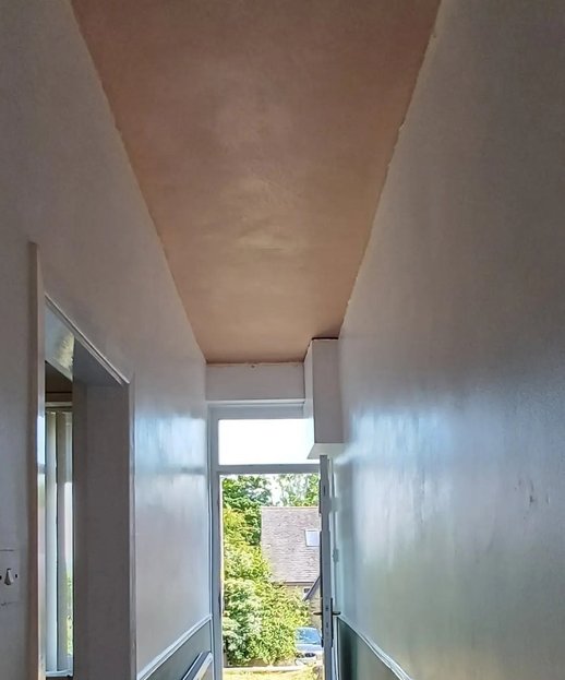 Corridor ceiling and walls after skimming