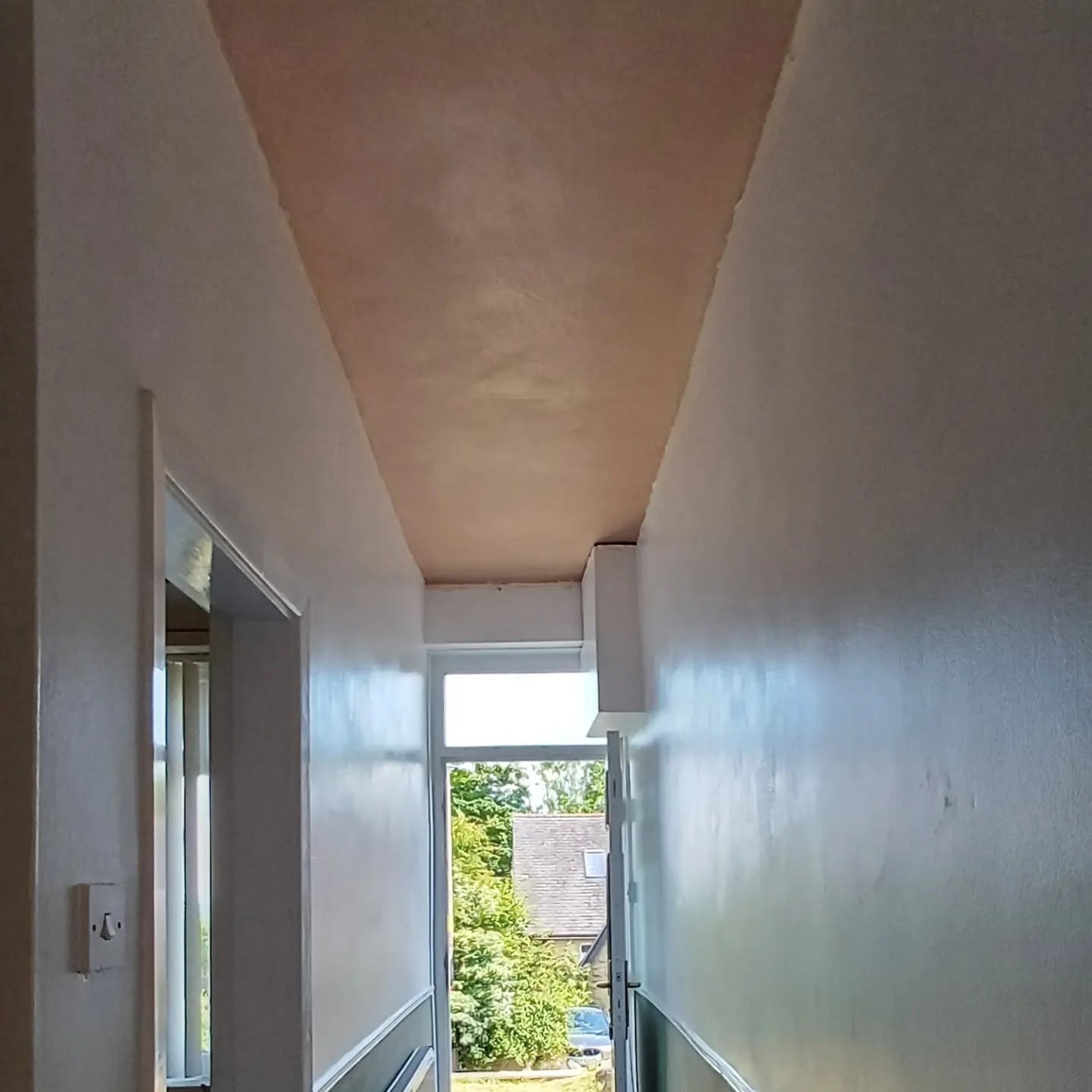 Corridor walls and ceiling after skimming