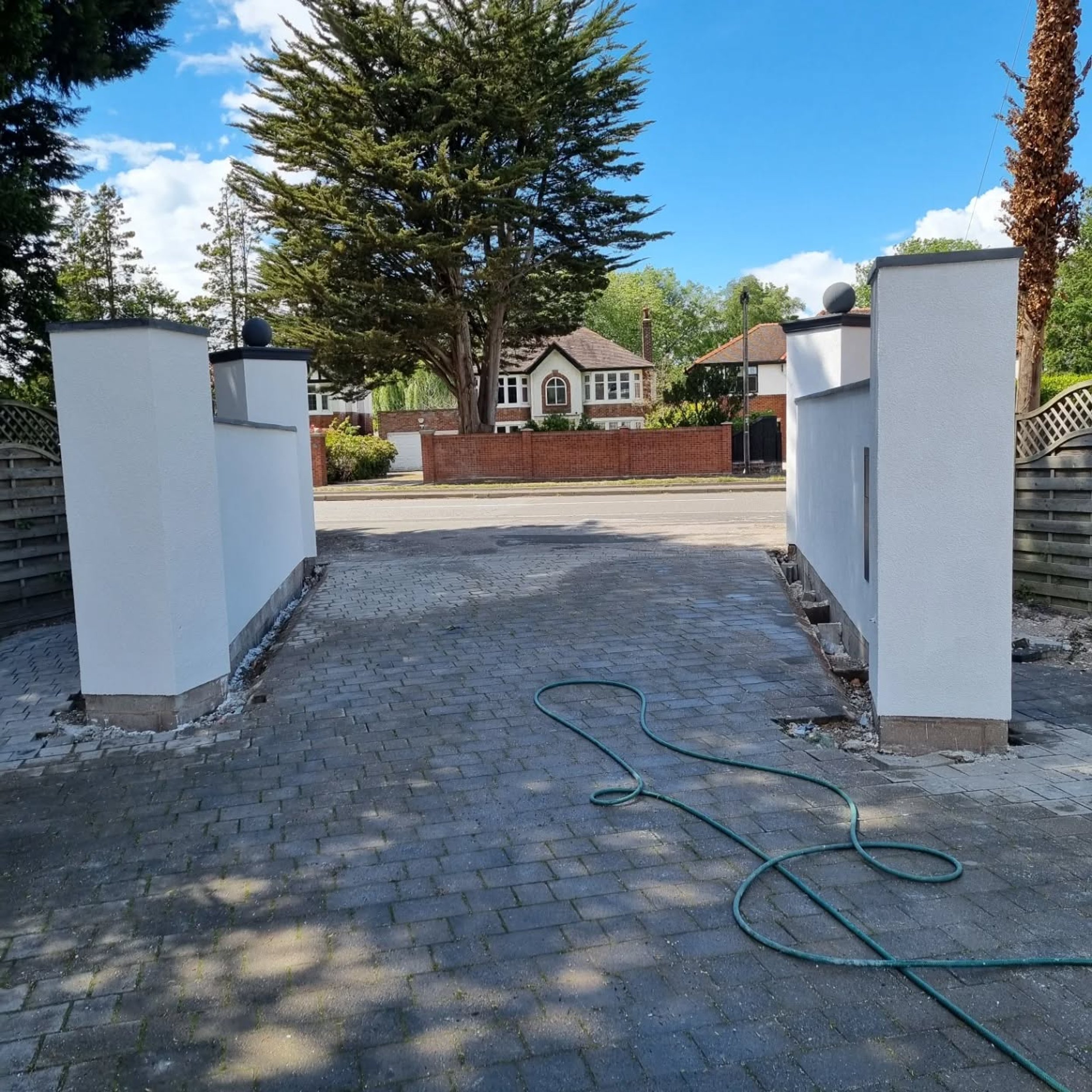 Rendered driveway entrance pillars
