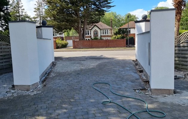 Rendered driveway entrance pillars